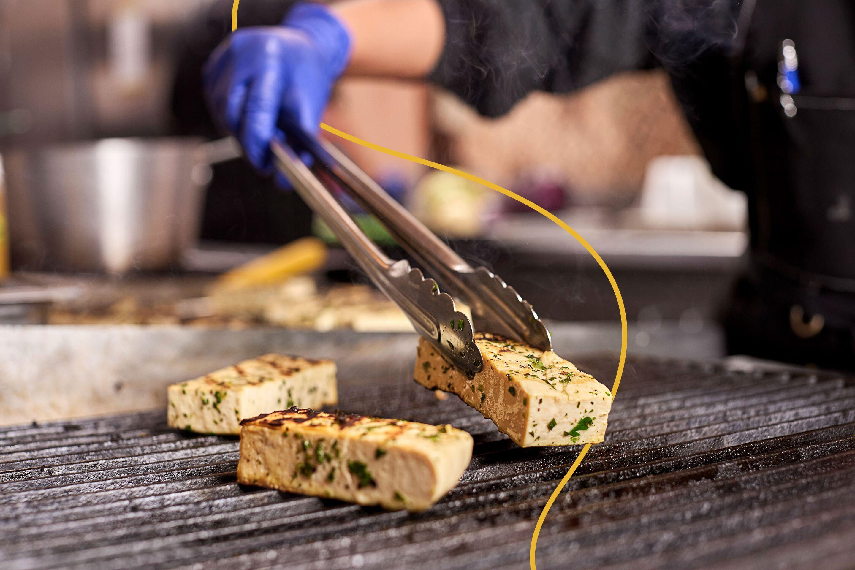 Chef grilling tofu